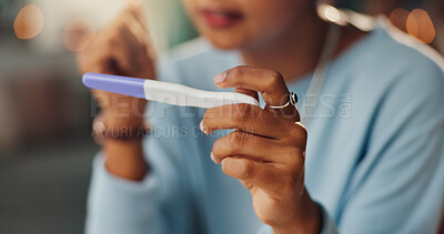 Buy stock photo Hands, result and woman with pregnancy test in home for fertility, ivf or ovulation planning. Healthcare, future and closeup of female person reading medical information on maternity stick at house.