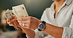 Money, hands or man in house with investment growth, bonus or loan payment, planning or financial freedom. Cash, security or male person counting cashback, profit or salary, savings or budget at home