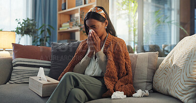 Buy stock photo Indian woman, house and sick with blowing nose on illness, flu and sinus in living room. Female person, sneeze and couch in lounge with blanket for fever, virus and allergy with tissue for infection