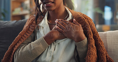 Buy stock photo Chest, hands and woman in home with pain, heart condition and hurt in living room. Illness, cardiovascular and virus for female person in winter, sore and healthcare for infection or cardiac problems