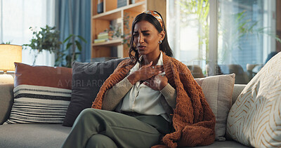 Buy stock photo Sick woman, hands and chest with infection, pain or virus on sofa in living room at home. Girl with illness, cold or flu for sore lungs, disease or acid from thyroid inflammation or respiratory ache