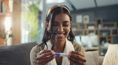 Buy stock photo Smile, girl and excited with pregnancy test on sofa for expectation of motherhood, future mother and good news. Woman, surprised and home with positive results, celebration and omg for ovulation.