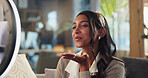 Kiss, smile and woman on couch for live stream, content creation or online platform in home. Streamer, influencer or girl on sofa with intro on mobile app to like, subscribe or follow on social media