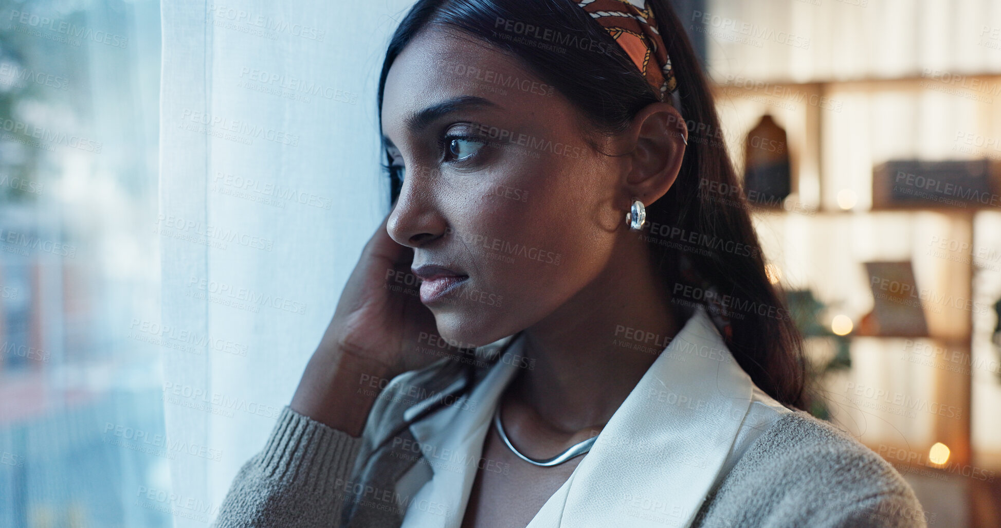 Buy stock photo Indian woman, worry and window in home with thinking or concern, storm with travel restrictions for work. Female teacher, glass or house with reflection for winter or weather, fear for climate change