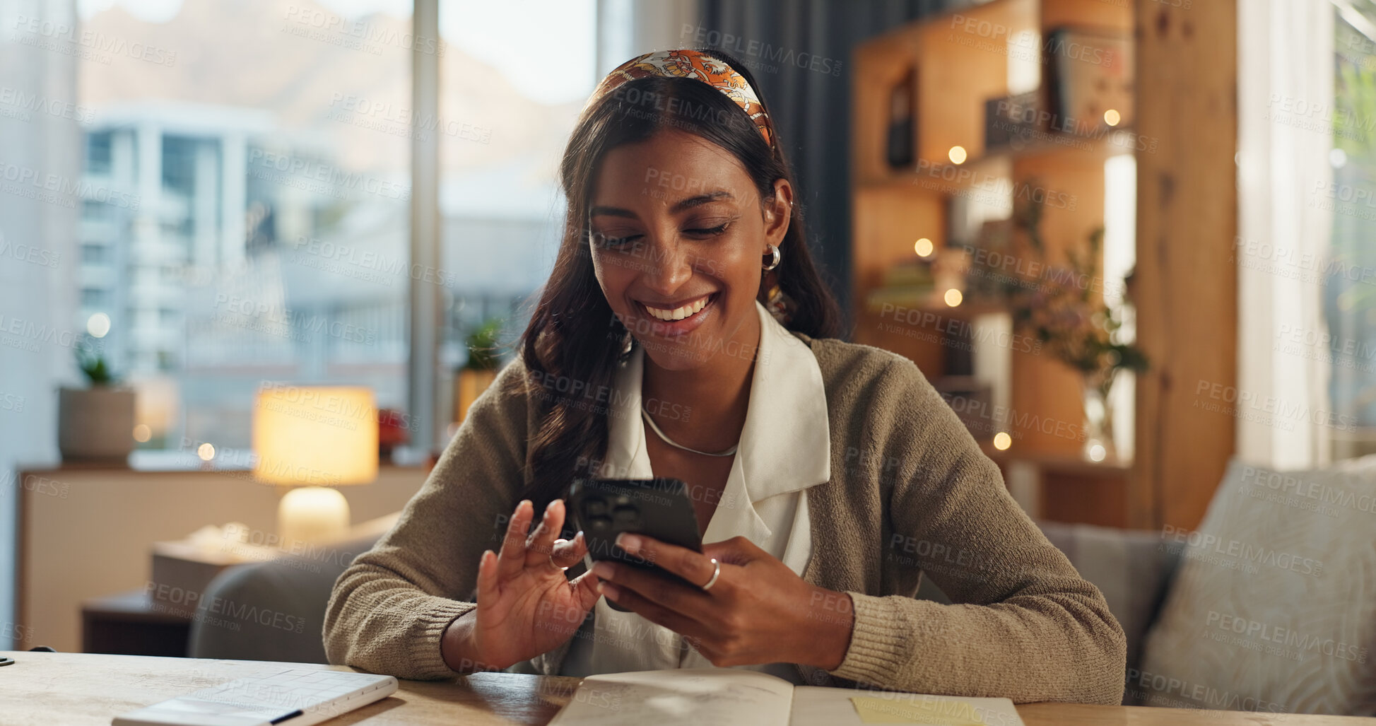 Buy stock photo Woman, happy and cellphone at desk for networking, communication and social media in home. Journalist, smile and online for research or website for internet, feedback and blog review in living room