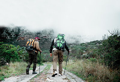 Buy stock photo Back, stick or friends on trail hiking outdoor adventure or journey in nature or forest for mountain travel. Clouds, workout and people in woods for holiday, walking or trekking to explore in France