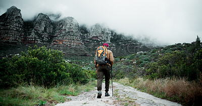 Buy stock photo Sky, mockup or man on trail hiking in outdoor adventure or journey in nature for travel or walking. Hiker, healthy and back of person on path in woods for holiday, exercise or trekking to explore