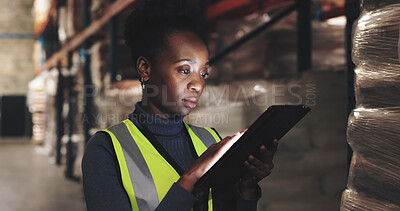 Buy stock photo Logistics, black woman and tablet in warehouse for checklist, inspection and stock management. Supply chain, employee or supervisor with digital for shipping orders, quality control and tech at night