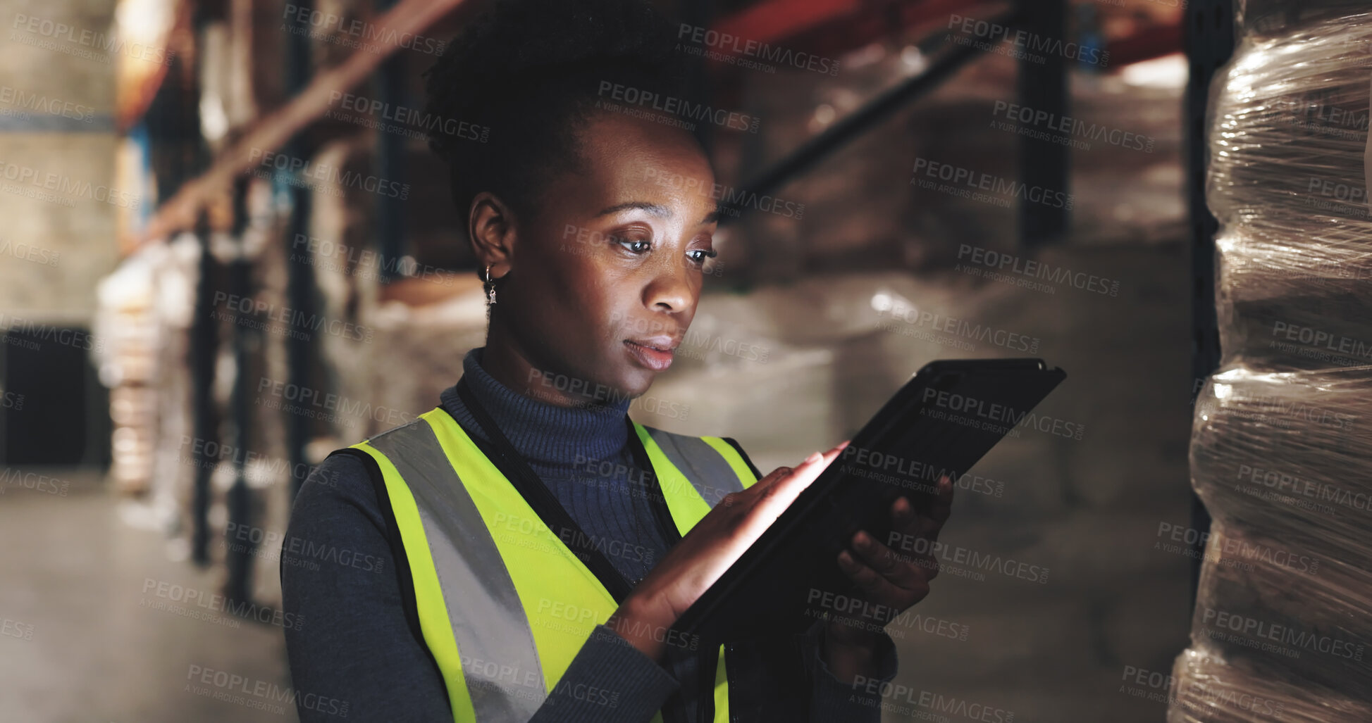 Buy stock photo Logistics, black woman and tablet in warehouse for checklist, inspection and stock management. Supply chain, employee or supervisor with digital for shipping orders, quality control and tech at night