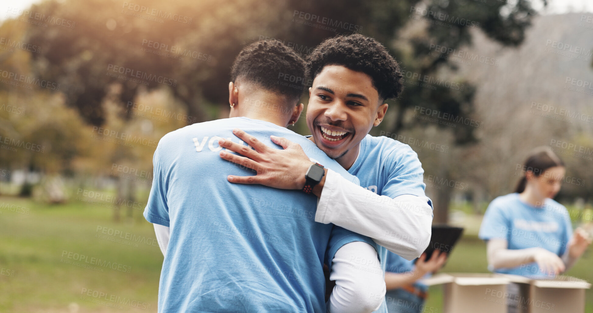 Buy stock photo Men, volunteer and people hug in park together for solidarity, support or sustainability at green ngo. Gratitude, nature and friends in embrace for teamwork, community care or social responsibility