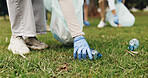 Cleaning, volunteer and hands of people in park with trash collection for sustainability, plastic and ngo project. Solidarity, garbage and group for charity, community care and social responsibility