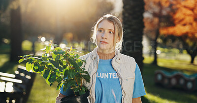 Buy stock photo Help, volunteer and woman in park with plant for growth, development or support on earth day. Green, woods and girl  thinking in nature for sustainability, community garden and social responsibility