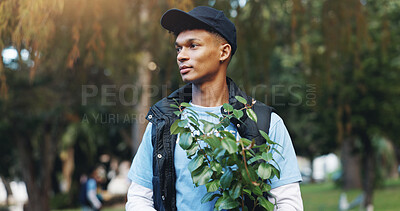 Buy stock photo Help, volunteer and man in park with plant for growth, development or support on earth day. Green, woods and person thinking in nature for sustainability, climate change and social responsibility