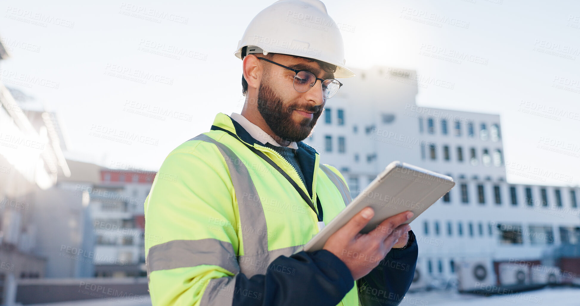 Buy stock photo Man, engineer or tablet on rooftop for construction planning, building maintenance or architecture. Contractor, typing or tech for project management in city for infrastructure development feedback