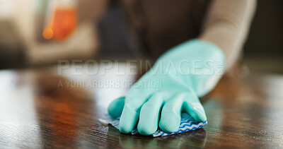 Buy stock photo Cloth, glove and cleaning table in home living room for hygiene, maintenance or housekeeping service. Wipe furniture, person or chores with rag on wood for dirt, dust or bacteria disinfection closeup