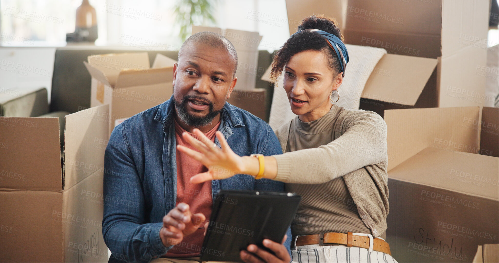 Buy stock photo Moving, tablet and idea with couple in new house for home renovation, digital layout or mortgage. Happy, Interior design, property investment and boxes with man and woman for real estate purchase