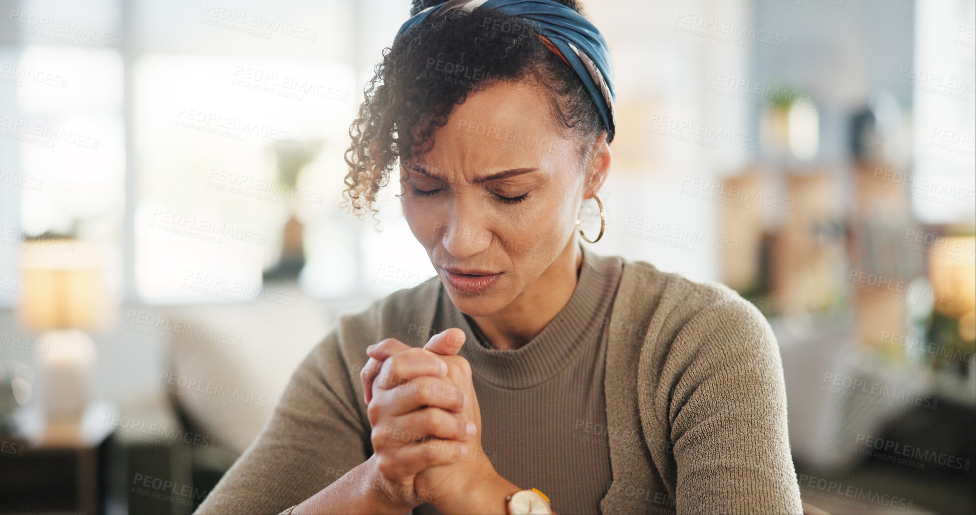 Buy stock photo Woman, home and praying as Christian for religion or spiritual practice, worship and faith. Female person, eyes closed and grace for appreciation, thankful and belief for trust and healing for trust