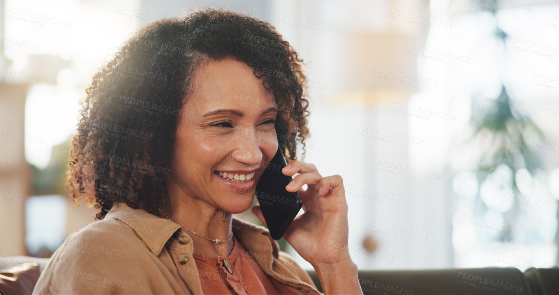 Buy stock photo Sofa, woman, and smile with phone call for conversation, listening and connection with contact. Home, female person and thinking with cellphone for answer, discussion and laughing at mobile joke