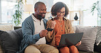 Success, laptop and happy couple celebrate with credit card for online shopping or discoun sale. Bonus points, ecommerce or African people on fintech app in home with rewards, voucher code or savings