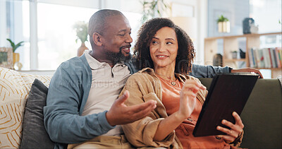 Buy stock photo Happy, couple and relax with tablet on sofa for online order, communication and decision on lunch. Interracial, man and woman with technology at home for takeout app, discussion and delivery of food