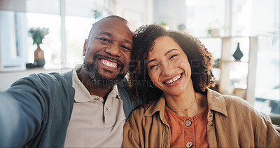 Buy stock photo Couple, happy and hug in house for selfie, love and bonding on sofa with connection, comfort and face. Man, woman and portrait in living room for weekend, care and support with memory on social media