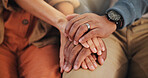 Holding hands, couple and comfort with support, empathy and love with compassion, care and relax. Closeup, people and man with woman, kindness and touching for anxiety, calm and peaceful in lounge