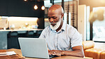 Senior black man, documents and laptop in home for immigration, typing or compliance for international travel. Mature person, computer and search for discount on flight booking, reading and website