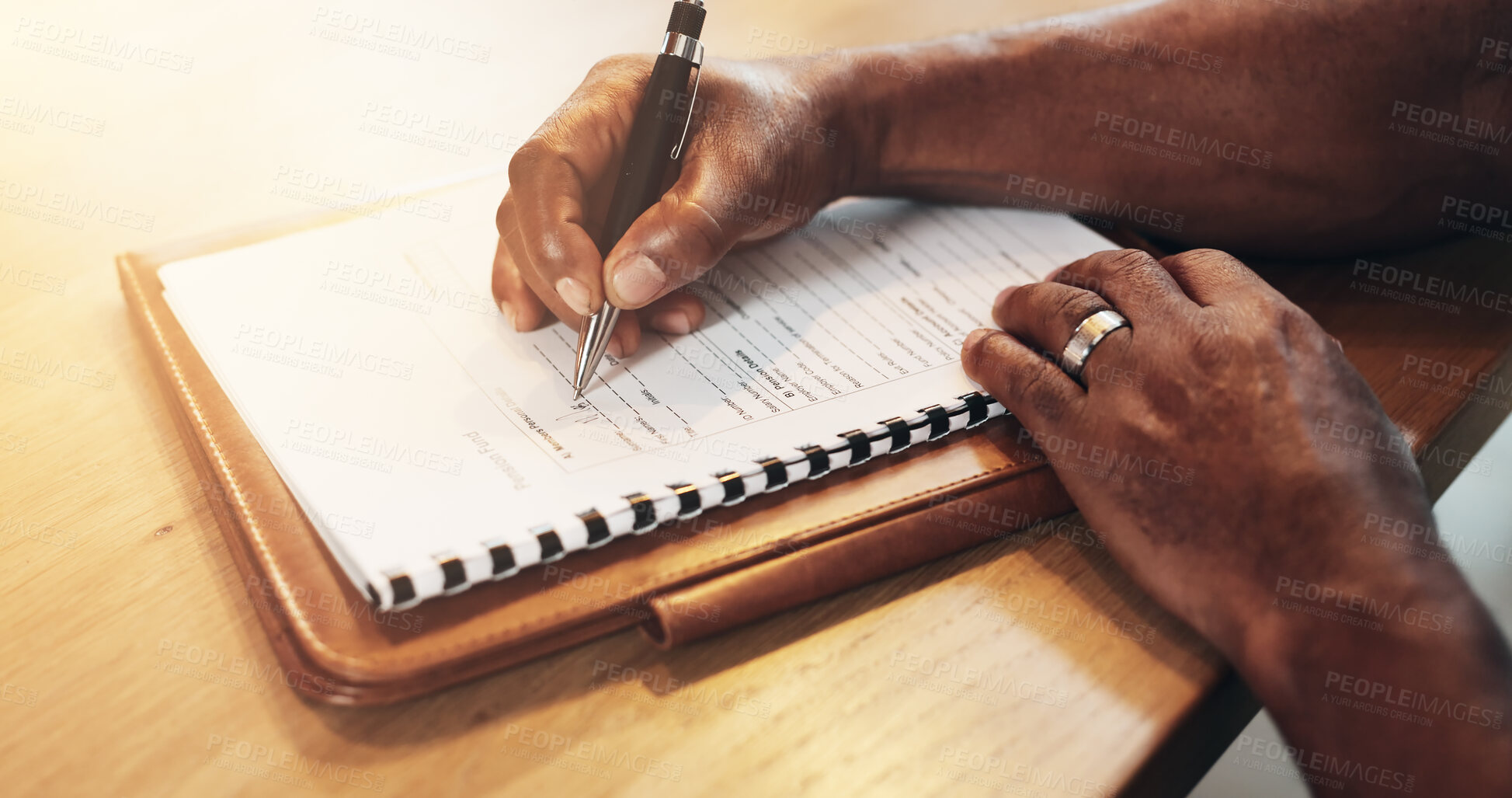 Buy stock photo Table, hands and black person with document for signature, agreement and approval of compliance. Above, desk and senior client with forms for pension fund, personal information and retirement benefit