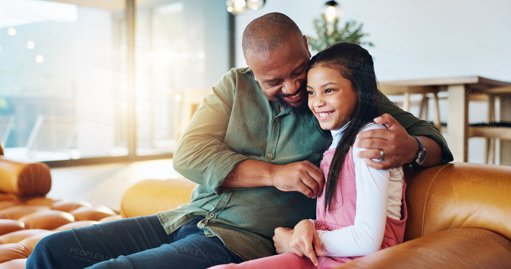 Buy stock photo Father, child and hug on sofa in home with bonding, affection and support with smile, love and care. Happy family, man and girl kid on couch with embrace for security, trust and relationship in house