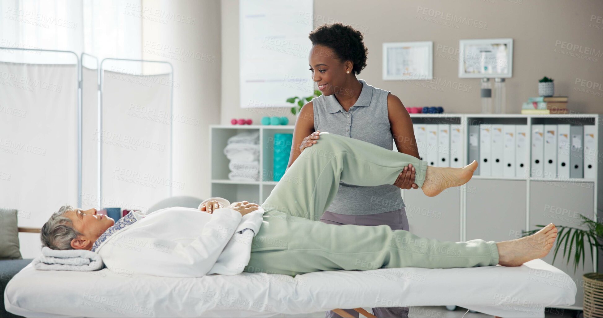 Buy stock photo Physiotherapy, stretching leg and senior woman with chiropractor for wellness, health and mobility. Healthcare, clinic and person with patient for physical therapy, rehabilitation and medical support