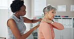 Woman, physiotherapist and patient with shoulder pain for injury or medical consultation at clinic. Female person, orthopedic and senior client with sore muscle, ache or tension at private practice