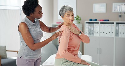 Buy stock photo Woman, physiotherapist and patient with shoulder pain for medical consultation or injury at clinic. Female person, orthopedic and senior client with sore muscle, ache or tension at private practice