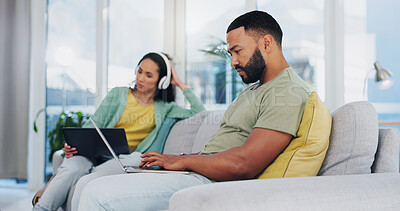 Buy stock photo Couple, relax and busy with laptop on sofa for personal business, communication or network at home. Young, man and woman with technology on couch for online connectivity, social media or browsing