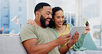 Excited couple, sofa and tablet with credit card for ecommerce, payment or banking app at home. Happy man, woman or shoppers with smile on technology for online shopping, transaction or purchase