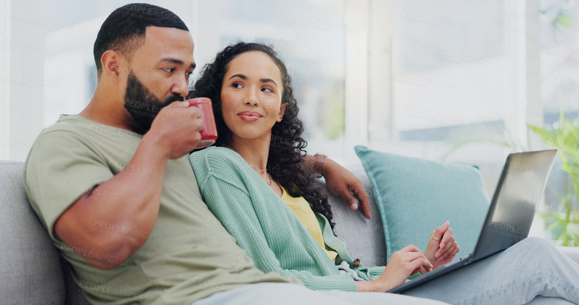 Buy stock photo Home, laptop and couple on sofa, connection and internet with coffee, relax and romance. Apartment, man and woman on couch, computer and research for life insurance, comfort and herbal tea in lounge