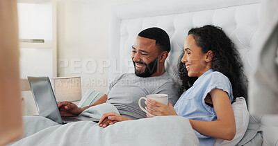 Buy stock photo Couple, laptop and coffee in bed, home and wake up with drink, movie or video with love in morning. Man, woman and computer with tea cup in bedroom with social network, meme and happy in apartment