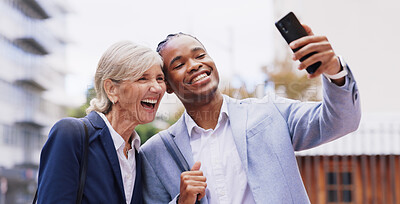 Buy stock photo Happy, business people and city with selfie for photography, picture or outdoor memory together. Interracial, businessman and woman with smile for fun moment, social or team building in urban town