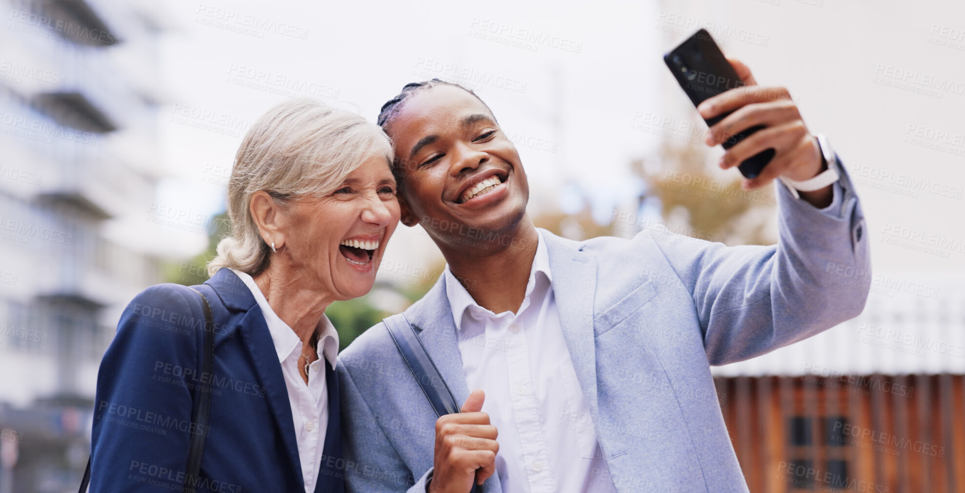 Buy stock photo Happy, business people and city with selfie for photography, picture or outdoor memory together. Interracial, businessman and woman with smile for fun moment, social or team building in urban town