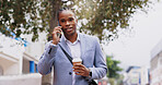 Black man, coffee and walking with phone call for communication, chat and client negotiation in city. Businessman, latte and travel outdoor with mobile conversation for networking or business deal