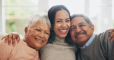 Buy stock photo Hug, portrait and smile of  parents with daughter on sofa in living room of home for bonding or visit. Face, family or love with senior mother, father and happy woman embracing in apartment together