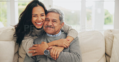 Buy stock photo Hug, portrait and smile of old man with daughter on sofa in living room of home for bonding or visit. Face, family or love with happy woman and senior father embracing in apartment together 