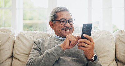 Buy stock photo Home, senior man and smartphone with typing, internet and message for contact, texting and relax. Mature person, apartment and elderly guy with cellphone, digital app and mobile user with network