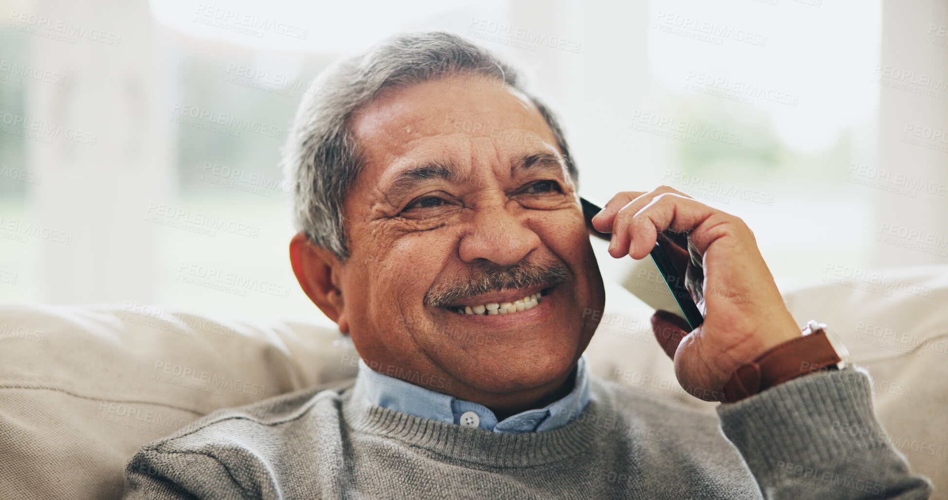 Buy stock photo Senior man, phone call and happy on sofa with conversation, memory and retirement with thinking in home. Elderly person, smartphone and smile with contact, reflection and chat on couch in living room