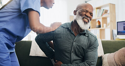 Buy stock photo Nurse, senior man and back pain in home with help, care or support for recovery from injury in retirement. Black people, physical therapy and elderly person with disability, muscle and rehabilitation