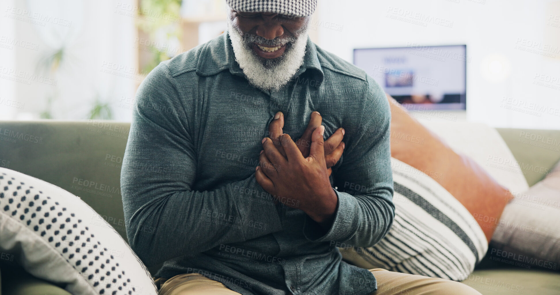 Buy stock photo Senior black man, heart attack and stress in home with chest pain, discomfort and fear. Elderly person, cardiac arrest and hypertension in living room with emergency, crisis and anxiety for health