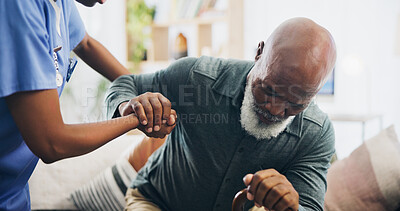 Buy stock photo Nurse, senior man and holding hands for walking by sofa, care and support for recovery from injury in retirement. Black people, cane and elderly person with disability, caregiver and rehabilitation