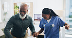 Nurse, senior man and recovery with walking in home for injury, care and holding hands with steps in retirement. Black people, balance and elderly person with disability, support and rehabilitation