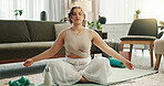 Home, meditation and woman with lotus, yoga and healthy girl with routine, calm and spiritual in lounge. Apartment, yogi and person in living room, chakra and fitness for wellness, zen and training