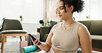 Break, reading and woman with smartphone, yoga and search on social media, online and relax in home. Fitness, digital and routine for wellness, app and mobile for tips, pilates and healthy in house