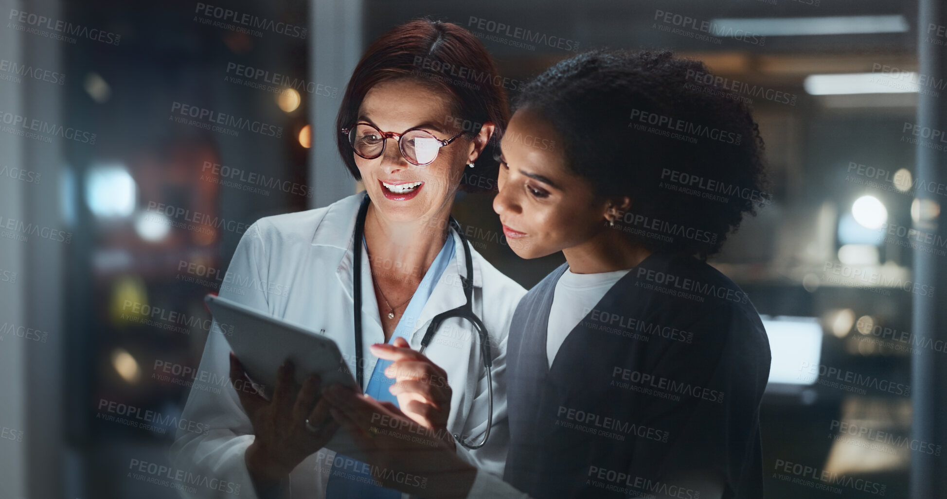 Buy stock photo Night, smile or doctor with surgeon on tablet reading online for news update or late schedule in hospital. Medical results, research or happy women with technology, clinic website or telehealth app